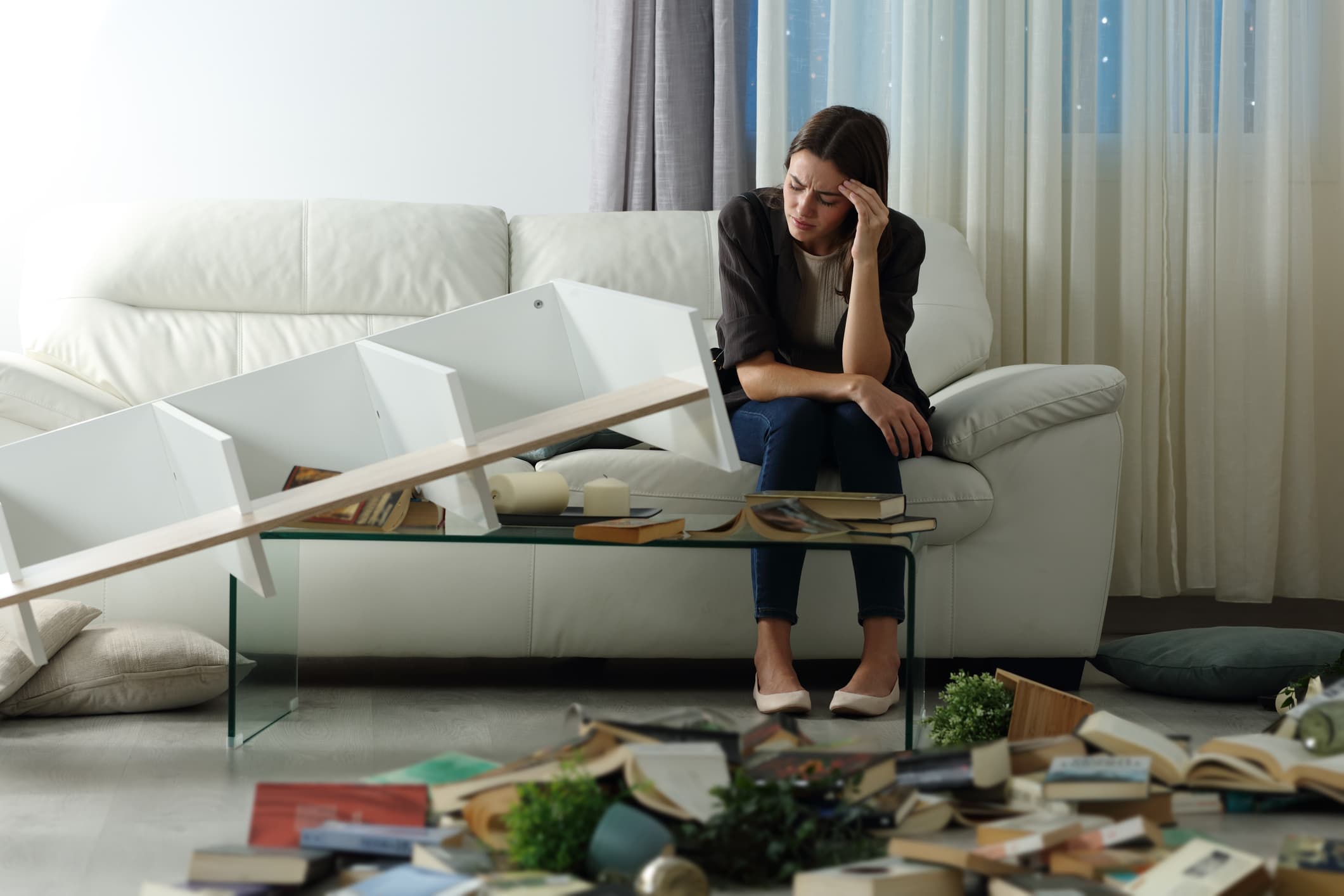 Woman upset in messy apartment after accident – cheapest renters insurance companies
