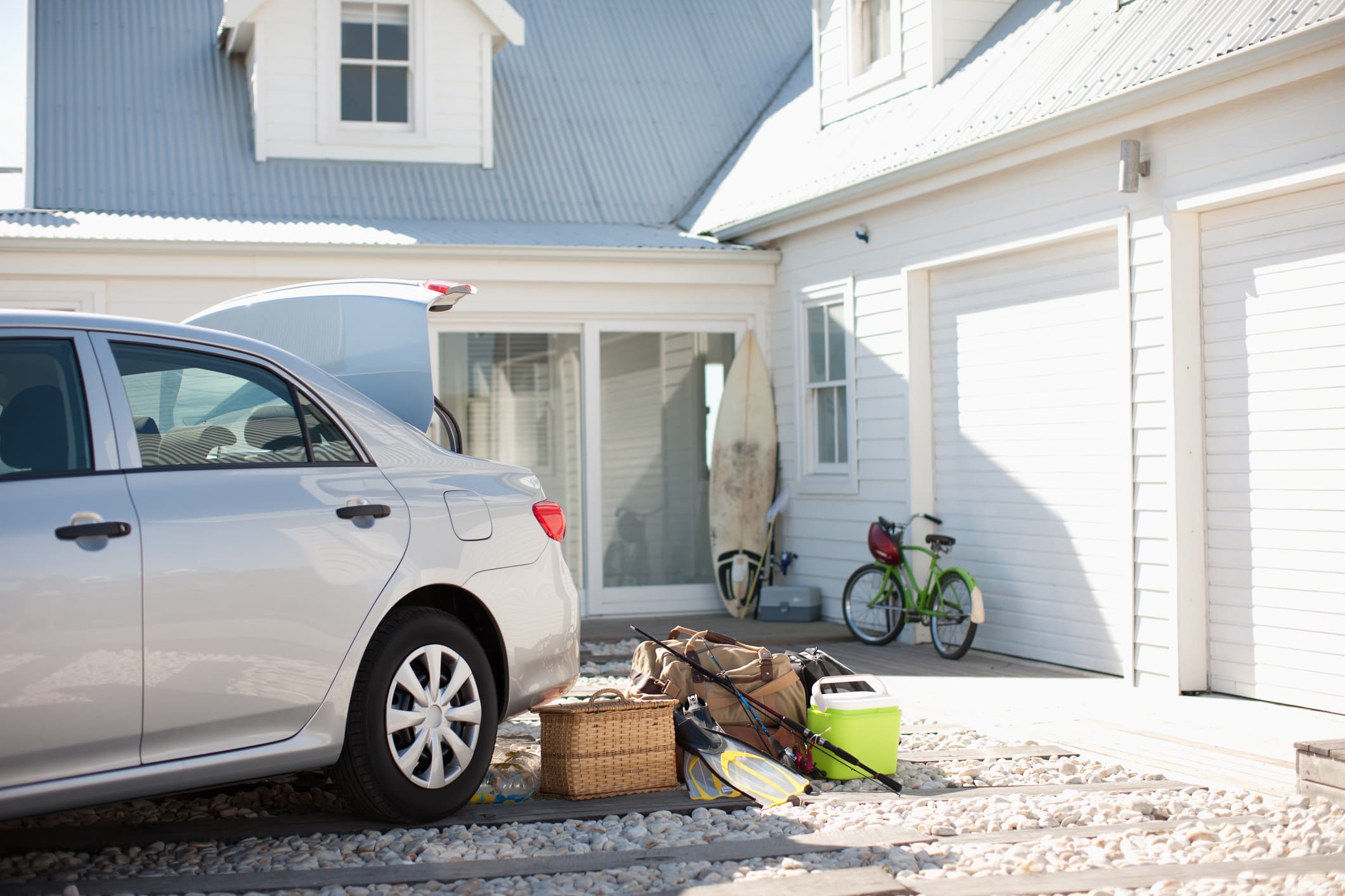 Farmers insurance review showing a home and vehicle representing bundled home and auto insurance coverage