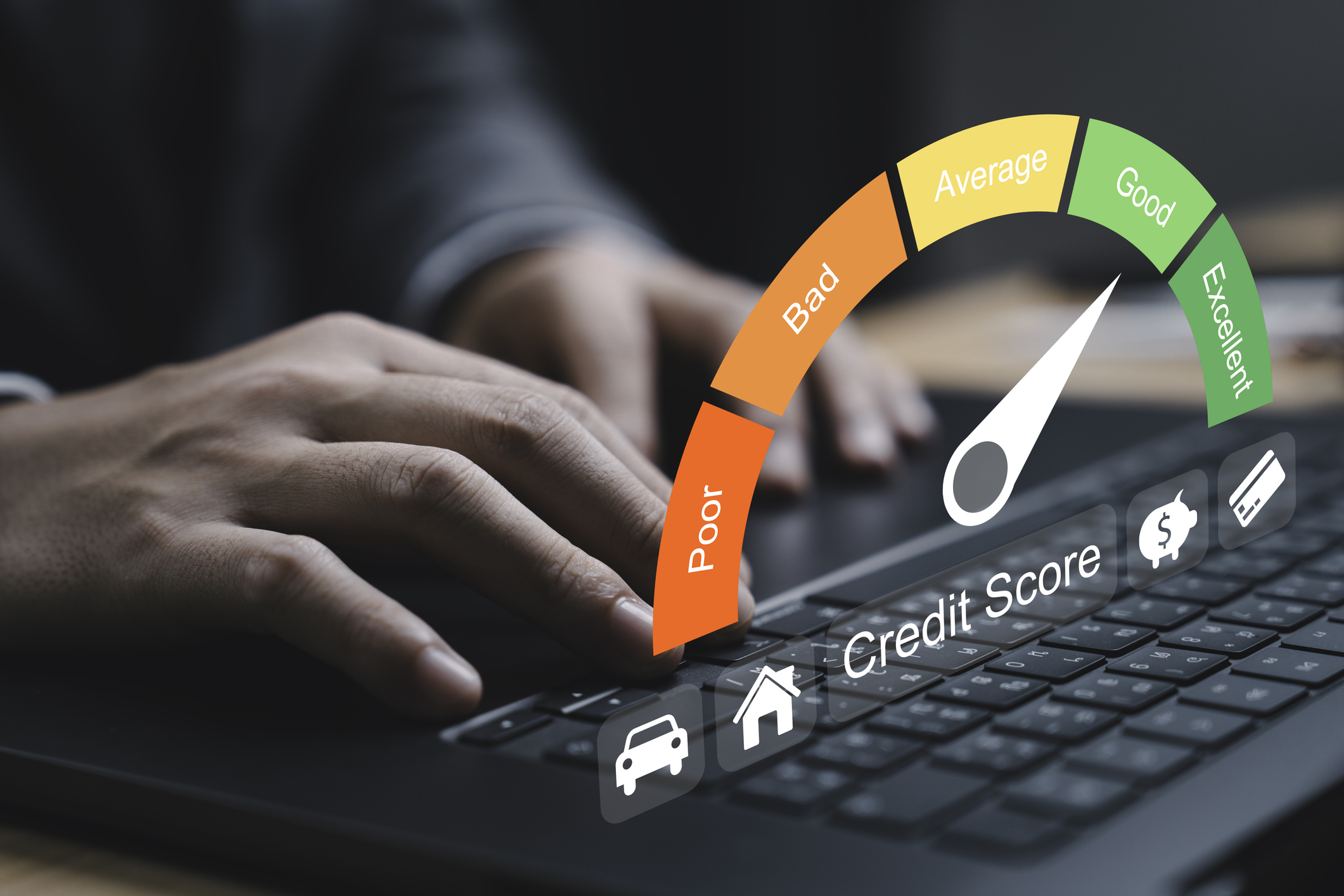 A person typing on a laptop with a digital credit score gauge, illustrating how debt consolidation can affect your credit.